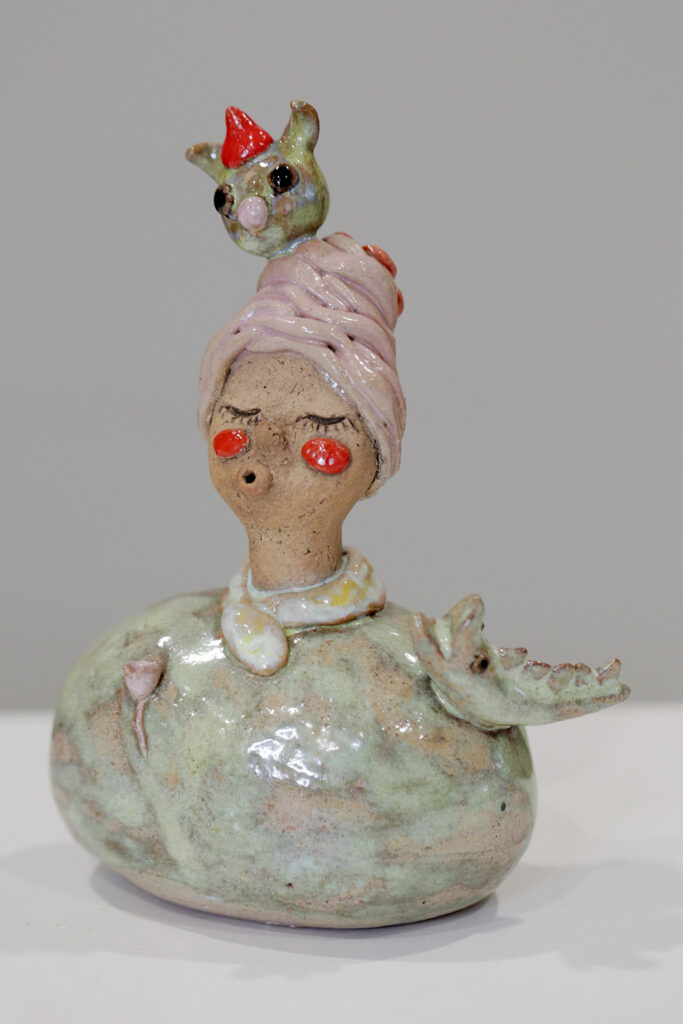 Cá sấu lên người